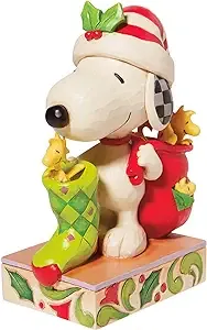 Enesco Peanuts by Jim Shore Snoopy with Woodstocks and a Stocking Figurine, 7 Inch, Multicolor