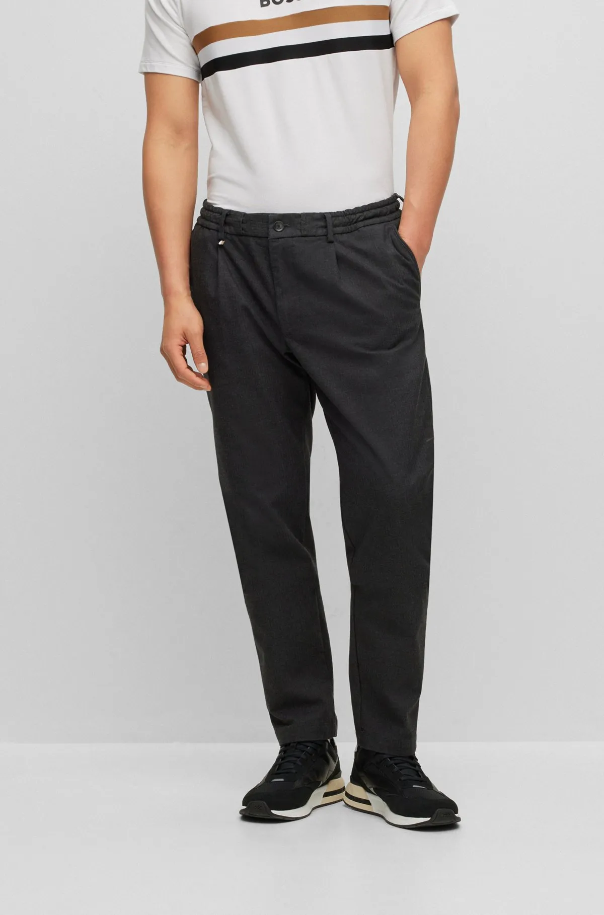 Slim-fit trousers in herringbone stretch fabric